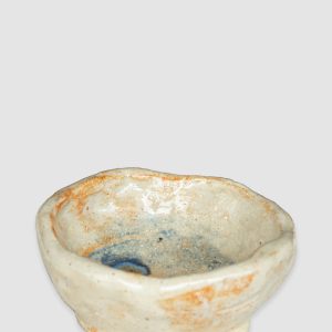 Handmade Australian ceramic bowl with an earthy neutral glaze and subtle blue accents, perfect for everyday use.