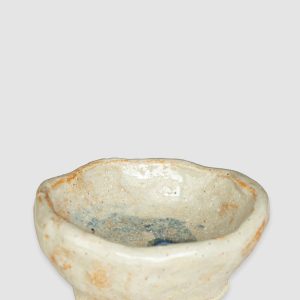 Handmade Australian ceramic bowl with an earthy neutral glaze and subtle blue accents, perfect for everyday use.