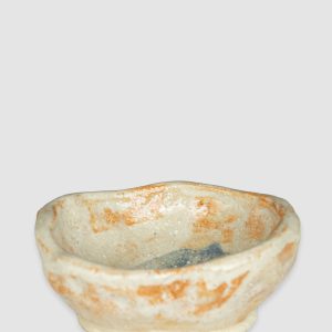 Handmade Australian ceramic bowl with an earthy neutral glaze and subtle blue accents, perfect for everyday use.